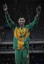 wayde van niekerk on podium successfully winning gold signed 12x8 photo