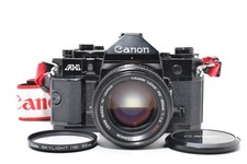 Appareil photo argentique 35 mm Canon A-1 noir avec objectif 50 mm f1,4 S.S.C...