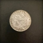 E Pluribus Unum Silver Coin is a 1881 Morgan silver dollar