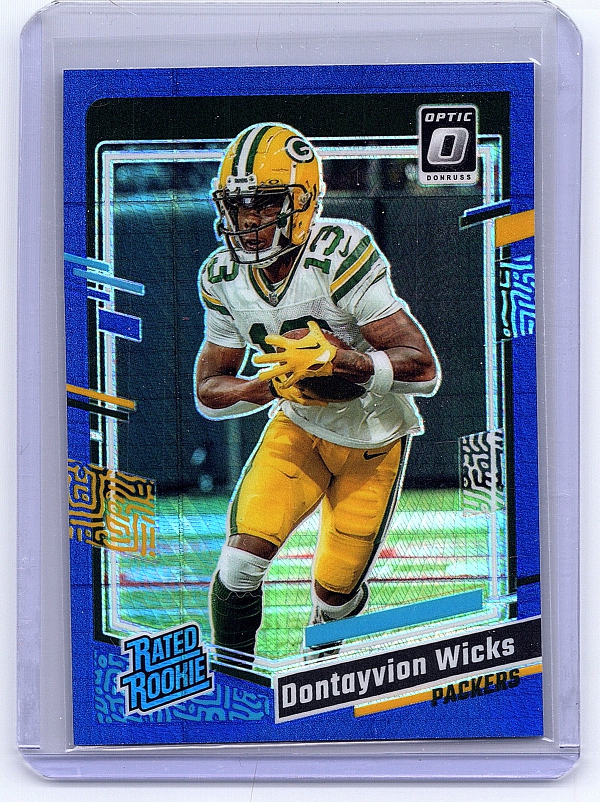 2023 Donruss Optic #249 Dontayvion Wicks Blue Hyper