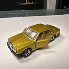 Vintage 1986 Matchbox No. 66 Gold Rolls-Royce Silver Spirit with Amber Windows