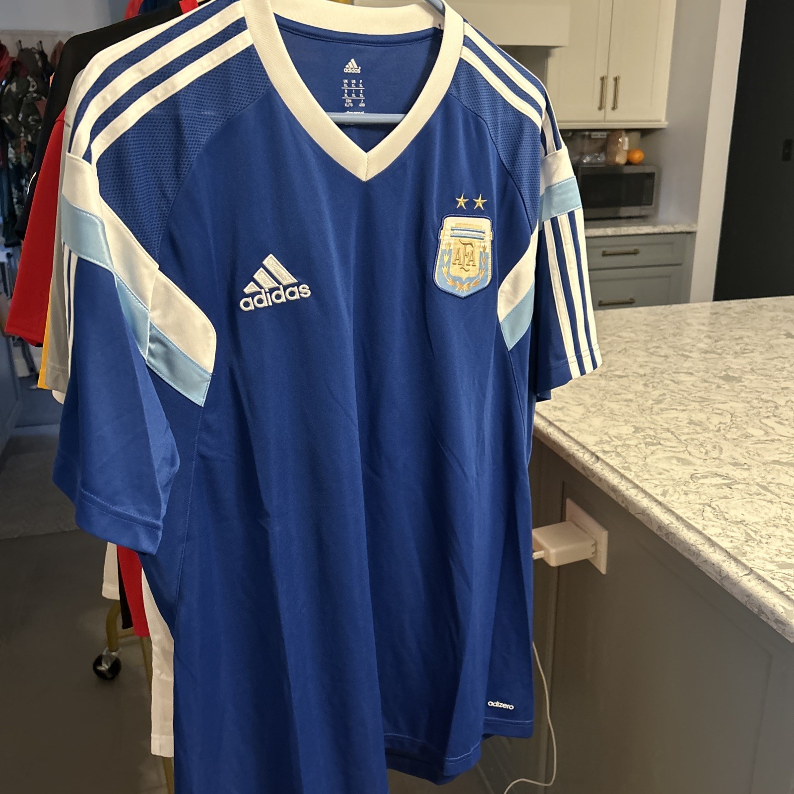 Adidas Argentina Adizero training shirt features a prominent 2-star crest. XL