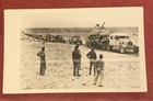 WW2 SHERMAN TANK on transporter  blocking traffic in desert. Contemporary photo.