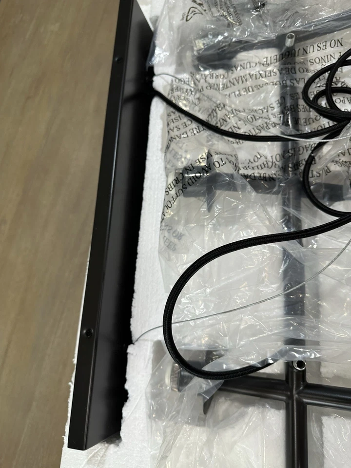 Lámpara de araña West Elm de vidrio escalonado de 8 luces bronce antiguo y plata Foto 3 de 4