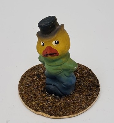 Stamm  House Little Angry Chick Man Wearing Hat On Grass  Stand