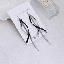 Clip on 3 3/4" long silver and black swirl chain earrings