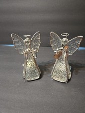 Two stained glass and metal angel candle holder figurines.
