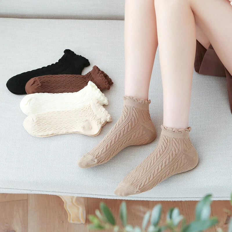 5 pares de calcetines de tubo medio con patrón transpirable liso de algodón para dama Foto 2 de 4