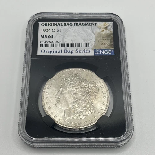 1904 O $1 NGC Morgan Dollar Original Bag Fragment MS63