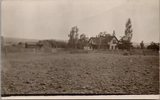 Real Photo Postcard Livestock Farm, Farmhouse, Outbuildings - AZO c1907-1918