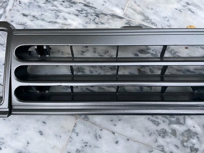 Toyota Starlet KP61 1982-1984 headlight bezels+radiator Grill