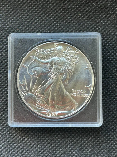 1987 SILVER EAGLE DOLLAR BULLION COIN IN UNCIRCULATED CONDITION (FOUR AVAILABLE)