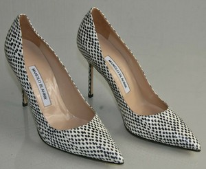 cream and black pumps