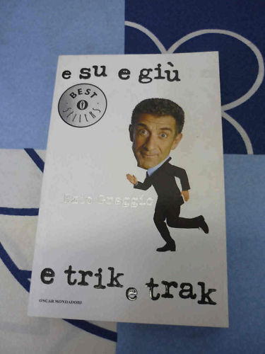 e su e giù e trik e trak Ezio Greggio