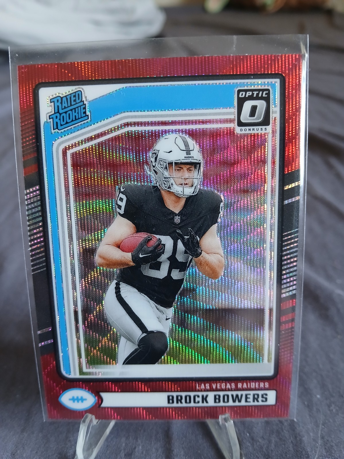 2024 Panini Donruss - Rated Rookie Brock Bowers Optic Preview Red Wave Prizm(RC)
