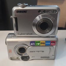 Lot of 2 Vintage Canon/Sony Digital Cameras- FOR PARTS/BROKEN-READ DESC 