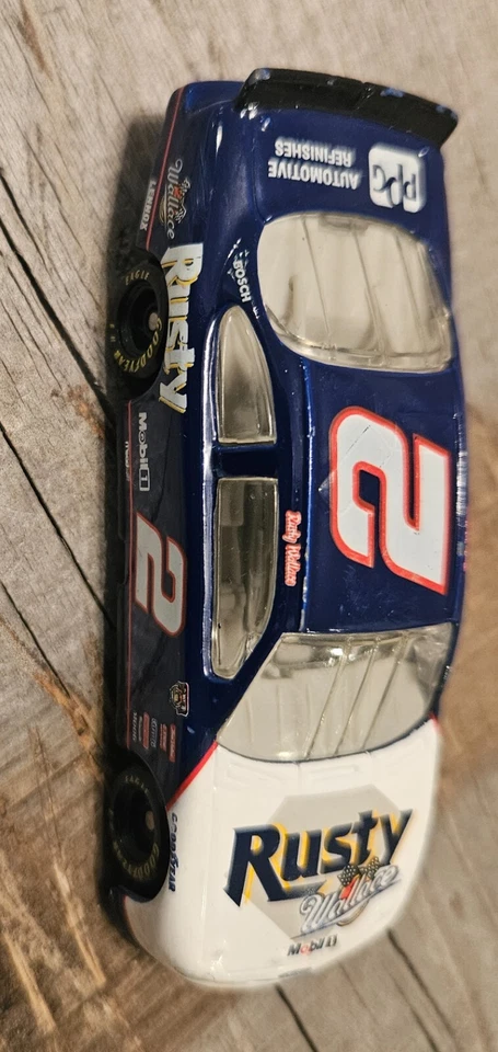 De colección Hasbro Rusty Wallace #2 Mobil 1 PPG 1998 Ford Taurus Diecast 1:64 NASCAR Foto 2 de 4