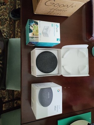 Google Home Mini Smart Assistant Speaker Bundle.  2 Units and Smart Plug