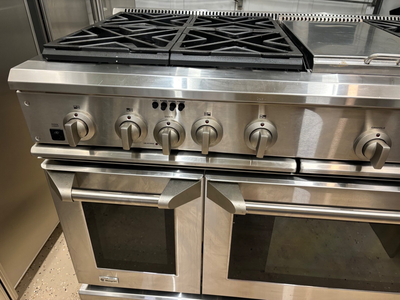 GE Monogram® 48" DualFuel Professional Range with 6 Burners, and
