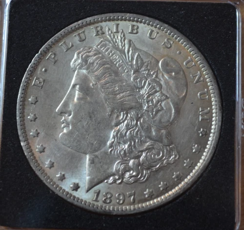 1897 O Morgan Silver Dollar $1 AU light gold toning and some mint luster