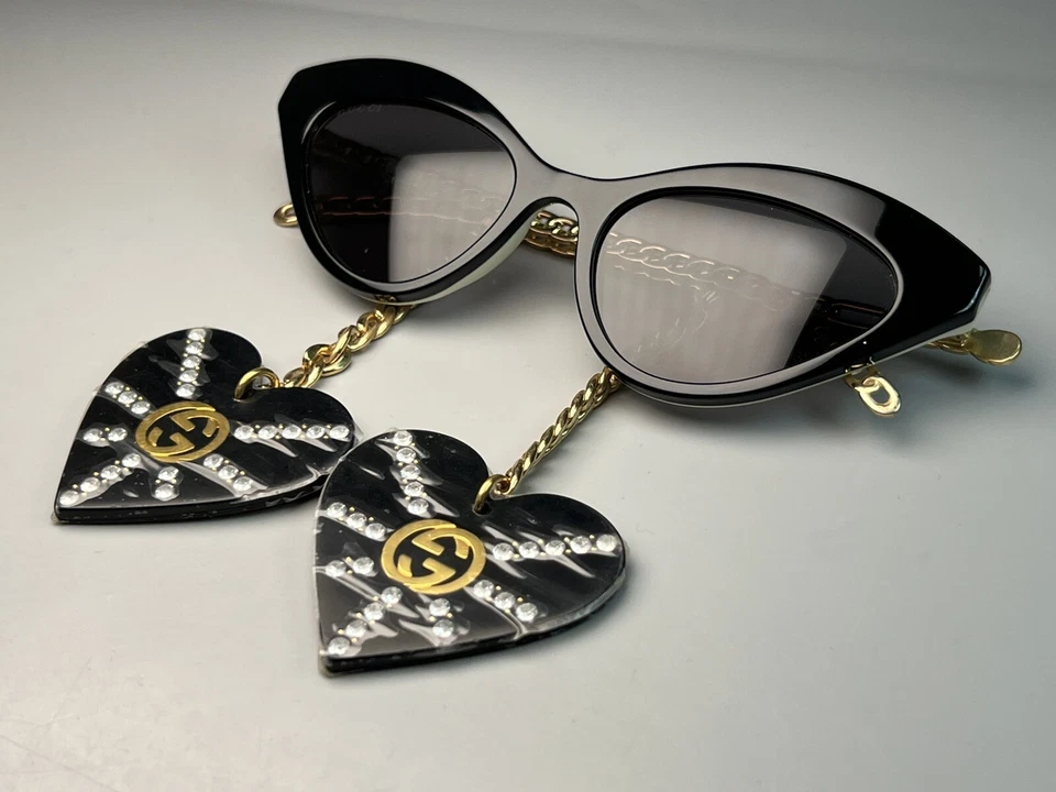 Nuevas gafas de sol Gucci para mujer GG0978S ojo de gato negras/doradas 52-140 cadena corazón Italia Foto 3 de 4