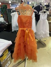 Child  s Orange Colored Dress. With Shoulder Shaw.
