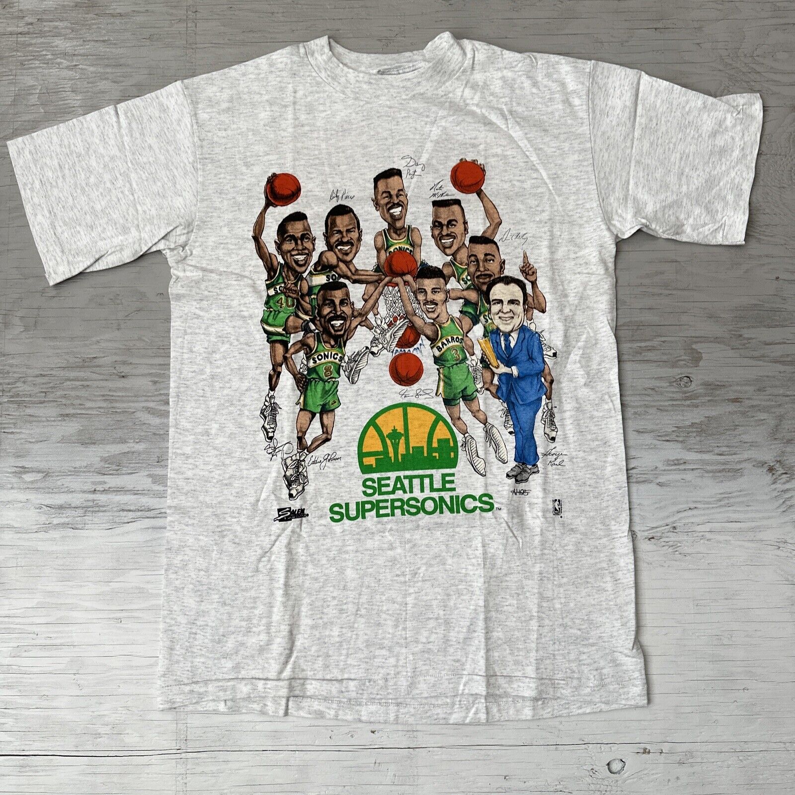 Vintage 1990's Seattle Super Sonics A.O.P. Salem Sportswear T-Shirt Sz