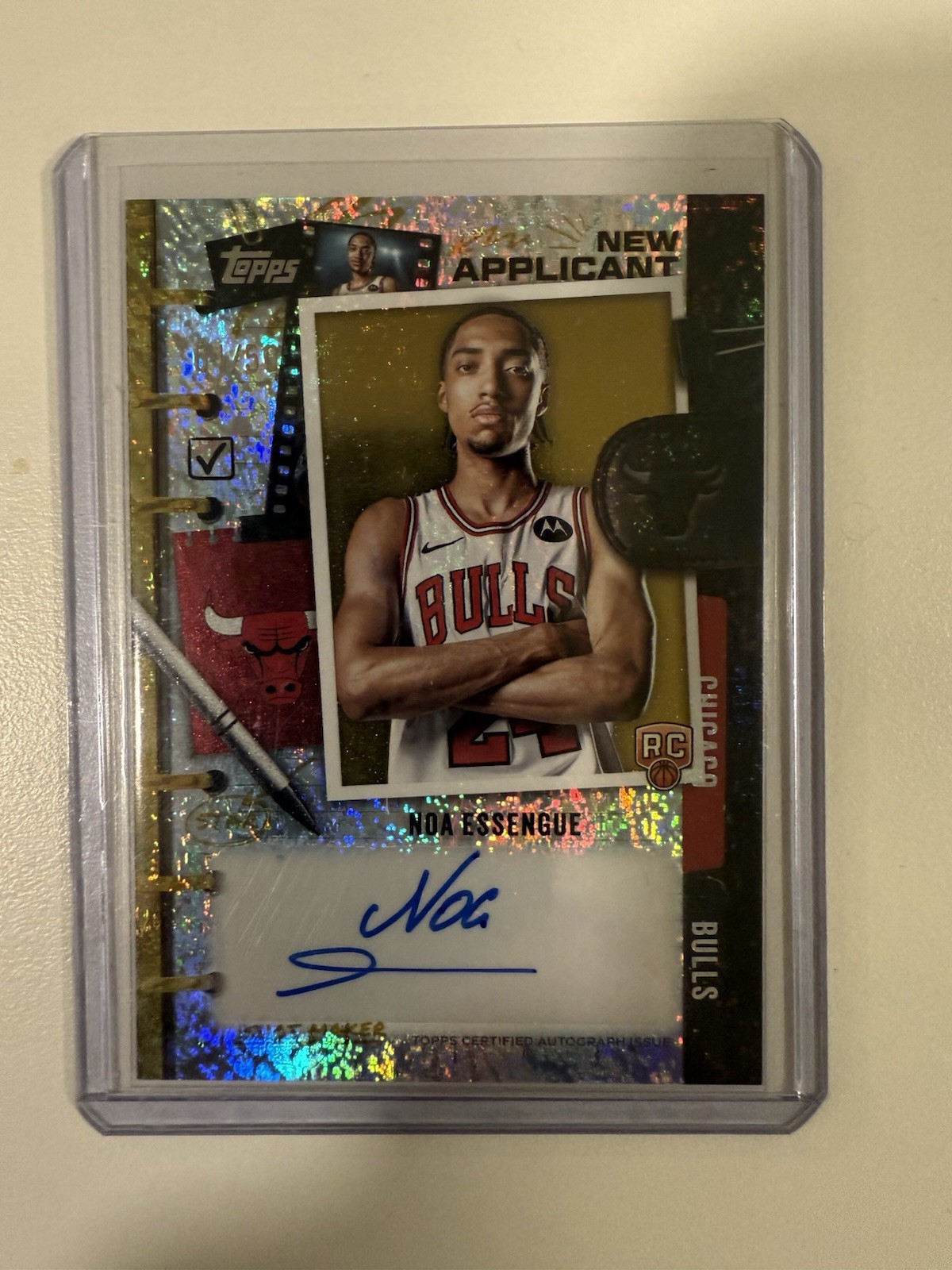 2025 Topps Noa Essengue New Applicant Auto (RC) (AU) (NA-NE) Gold Holo Foil /50