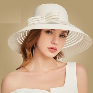 big white floppy sun hat