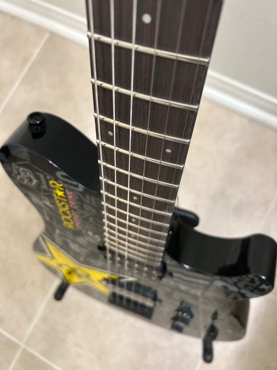 Signed Rockstar energy Branded STERLING MUSIC MAN AX20 Electric