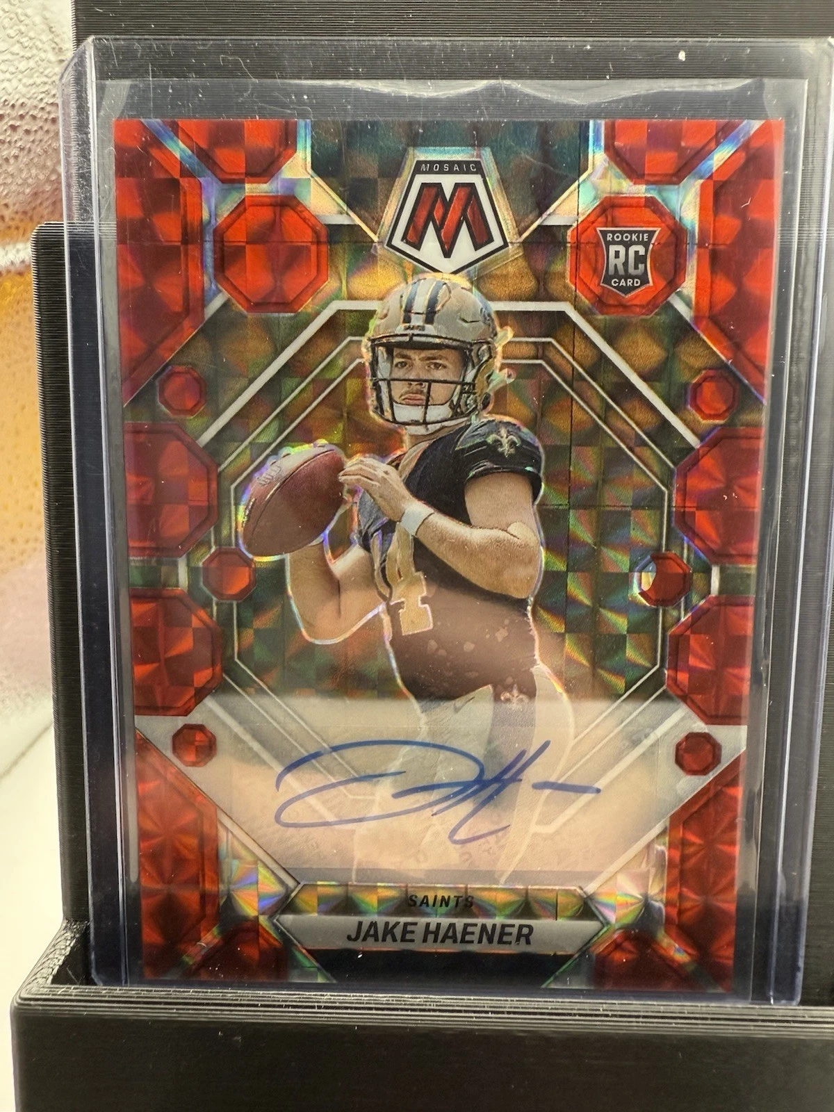 2023 Panini Mosaic - Rookies Jake Haener #325 Red Mosaic Prizm Autographs...