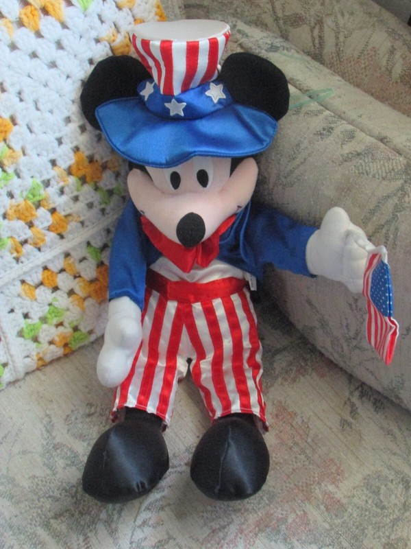 plush patriotic Mickey Mouse, with damaged flag