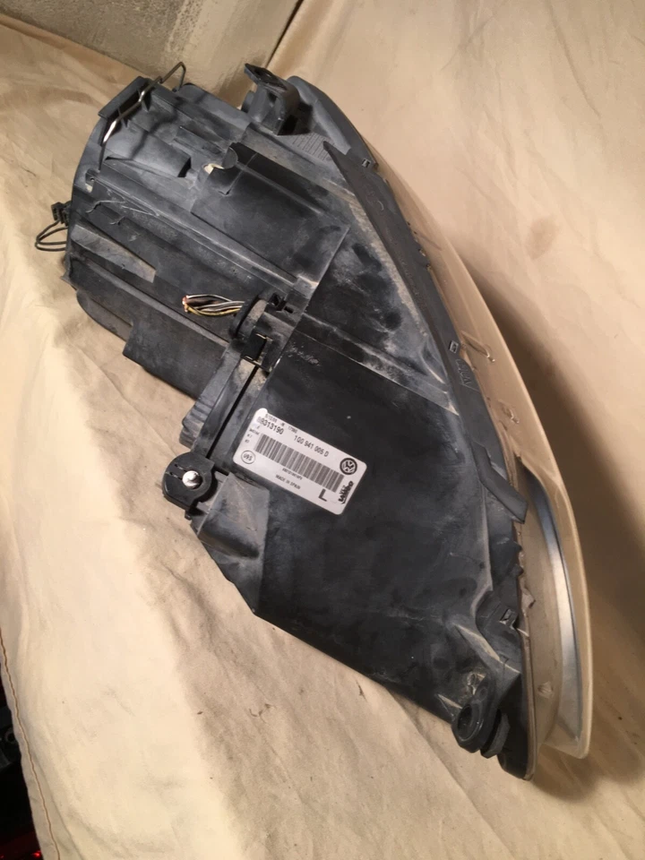 Conjunto de lámpara lateral izquierda de faro halógeno para conductor izquierdo VW Eos 2007-2011 OEM Foto 4 de 4