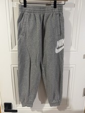 Gray Nike Jogger sweatpants with white logo, boys Youth size L.