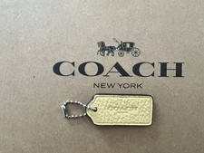 COACH Logo New York Hang Tag Charm Purse w Chain Pebble Leather 1.75'' x 0.75"
