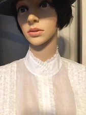 Women's  Tahari white sheer blouse w/short sleeves.