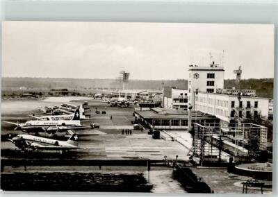 39461568 - 6000 Frankfurt Rhine-Main Airport with Tower and Propeller Machines