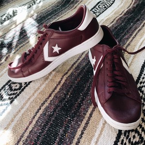 purple leather converse