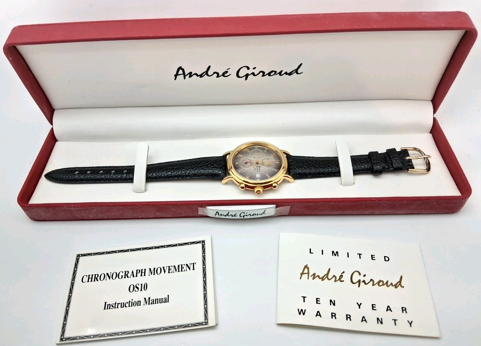 NOS Men's André Giroud Chronomaster quartz wristwatch with a gold-tone case