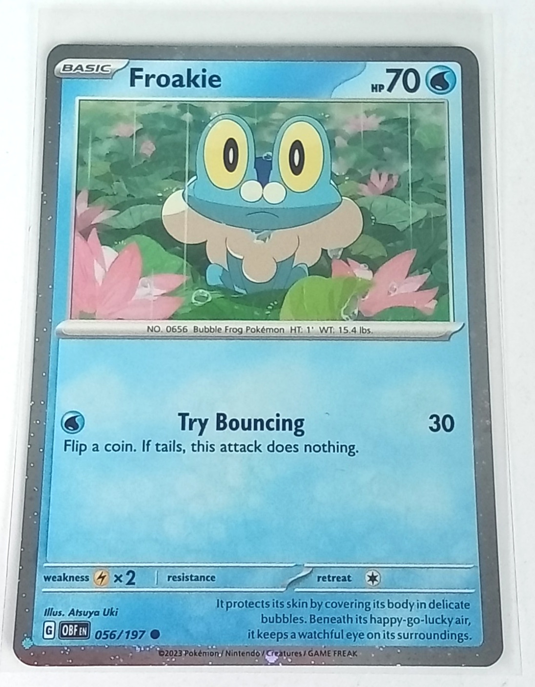 Froakie 56/197 Obsidian Flames Cosmo Holo Pokémon Card 2023
