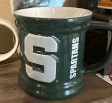 Michigan State Spartans Coffee Mug. Green w/ White Letters From The encore Group