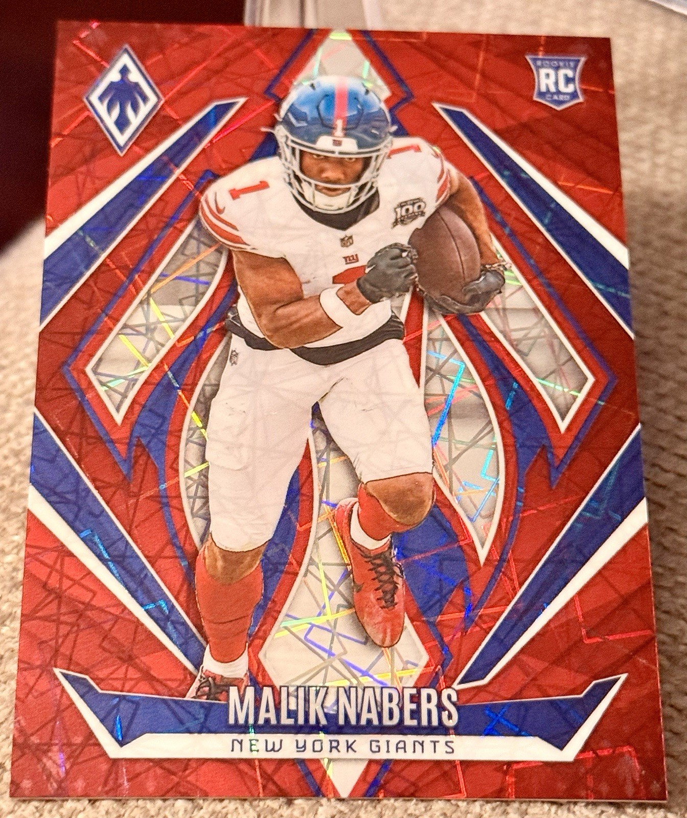 2024 Panini Phoenix Rookies Malik Nabers #221 Red Lazer /199 (RC) MINT