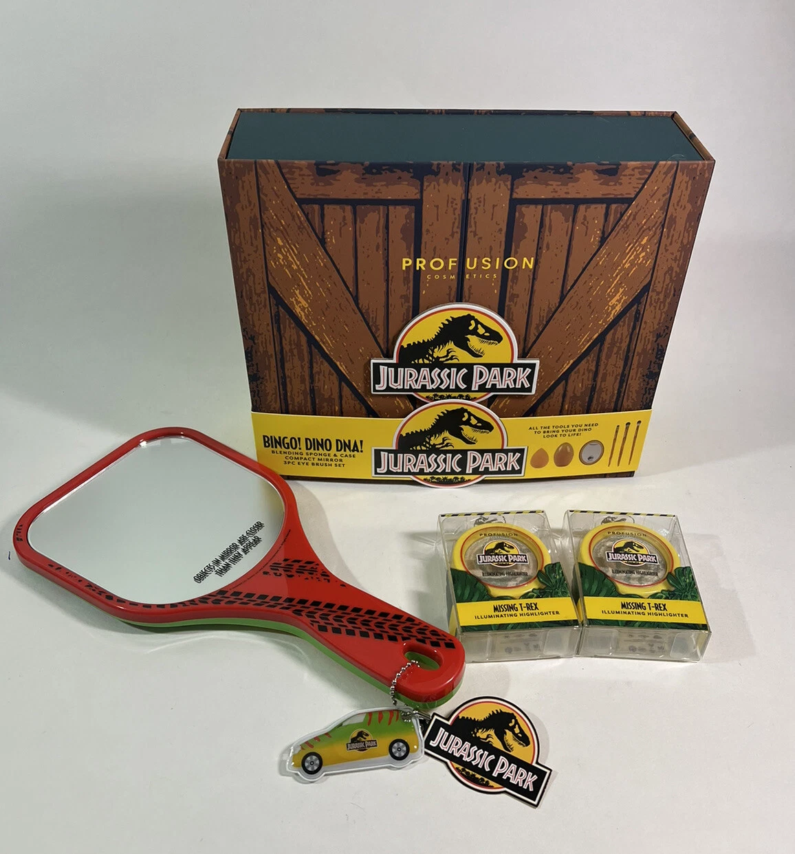 Jurassic Park Profusion Cosmetic Lot Amber Brush Set Hand Mirror Highlighters