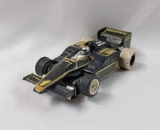 AURORA AFX G + Plus INDY #1 LOTUS Mario Andretti Black Yellow