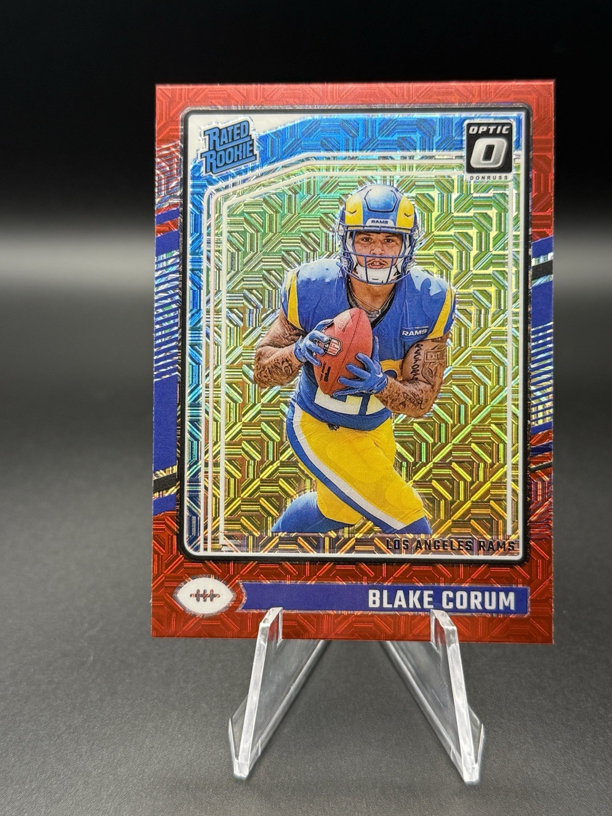 2024 Panini Donruss Optic - Rated Rookie Blake Corum #208 Red Mojo Prizm (RC)