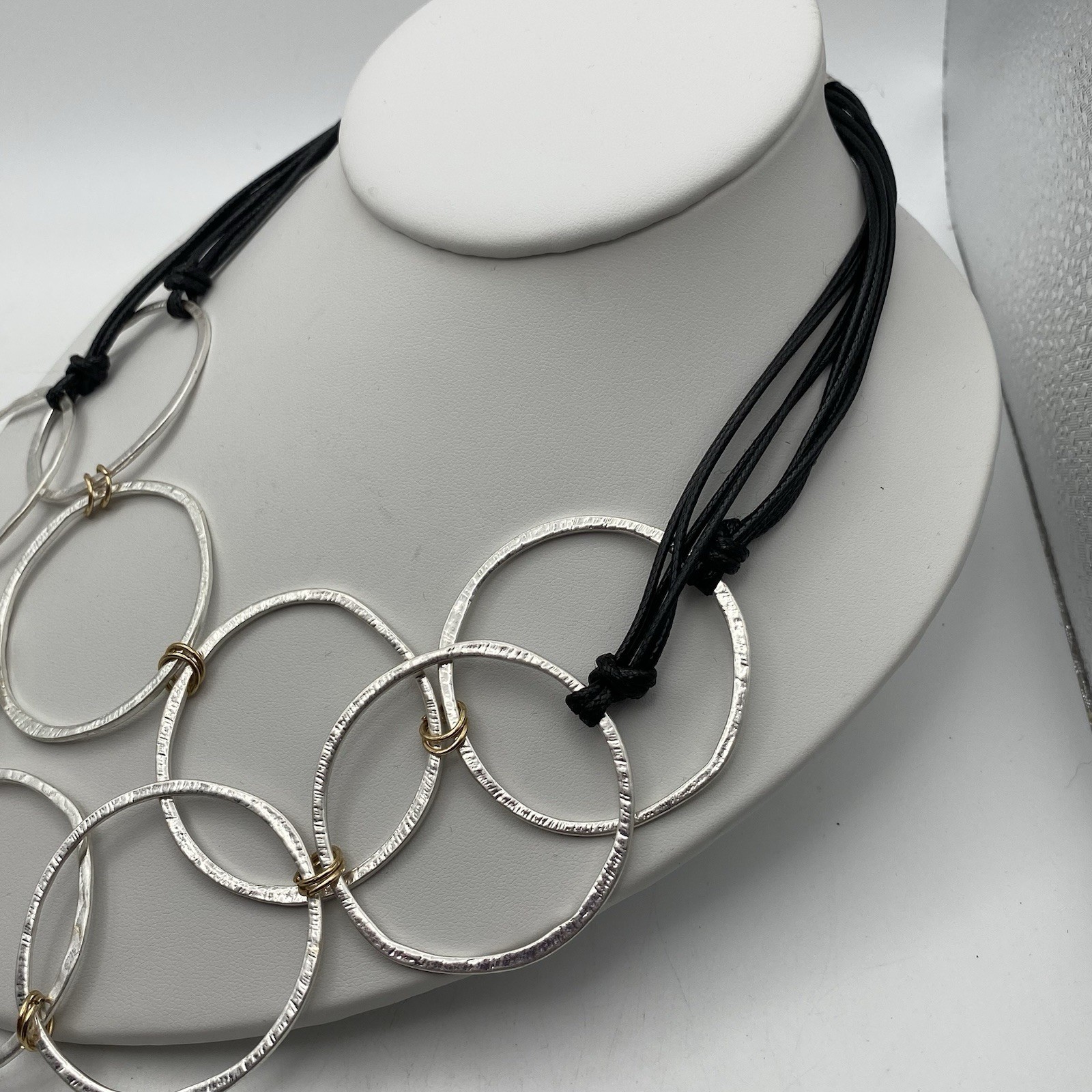 Bold Silver Tone Hammered Interlocking Rings Stat… - image 3