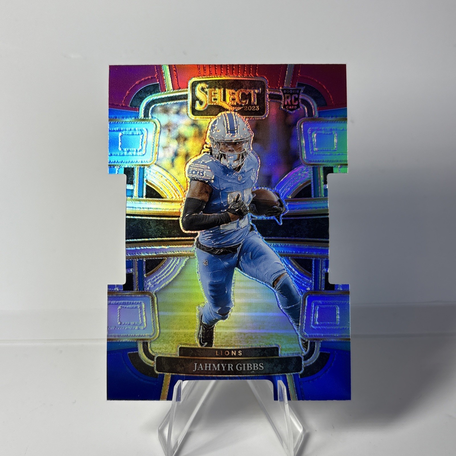 2023 Panini Select - Concourse Jahmyr Gibbs #34 Red & Blue Prizm Die-Cut (RC)