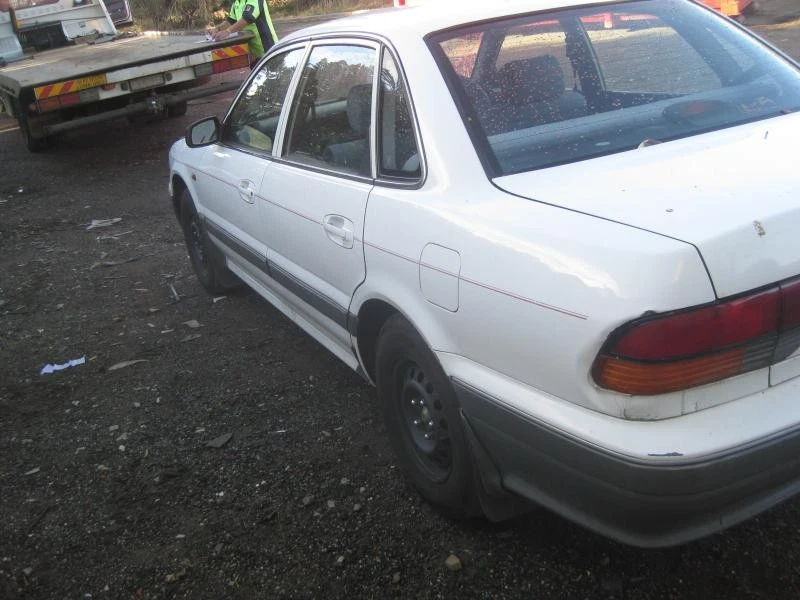 MITSUBISHI MAGNA LEFT HEADLAMP TR-TS HELLA 03/1991-04/1996 - image 2 of 4