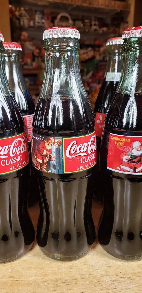 VINTAGE Coca Cola Christmas Santa Bottles lot of 10 unopened *READ