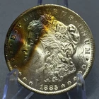 1885-O Morgan Silver Dollar $1 BU Rainbow Toning Obv Color R65